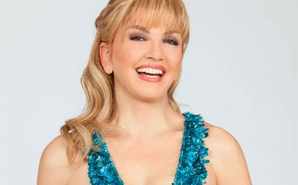 Milly Carlucci indossa davvero la parrucca? Ecco gli indizi che non lasciano dubbi [FOTO]